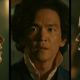 Spike Spiegel (John Cho), Jet Black (Mustafa Shakir), and Faye Valentine (Daniella Pineda), engage in conversation, separated by black bars